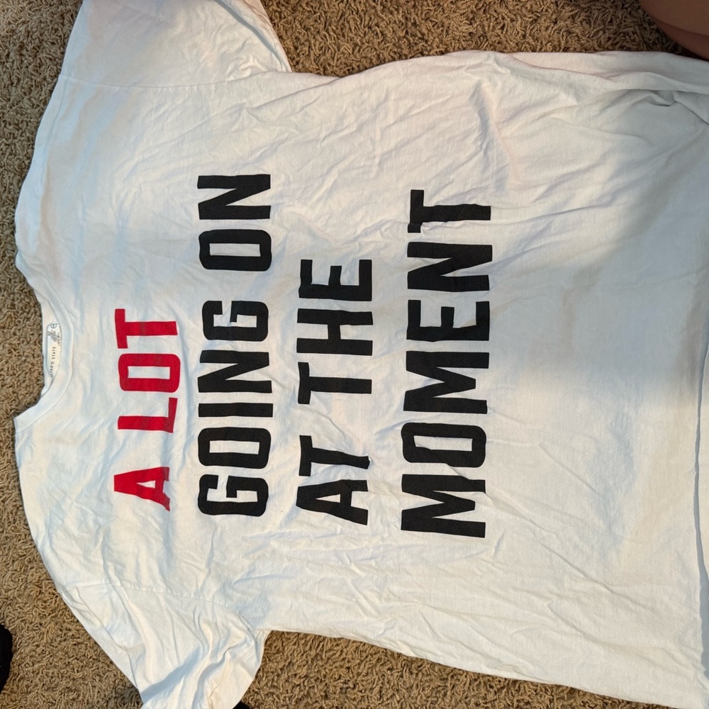 White Graphic Tee with Bold Text